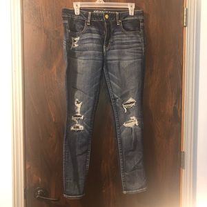 american eagle ripped blue jeans